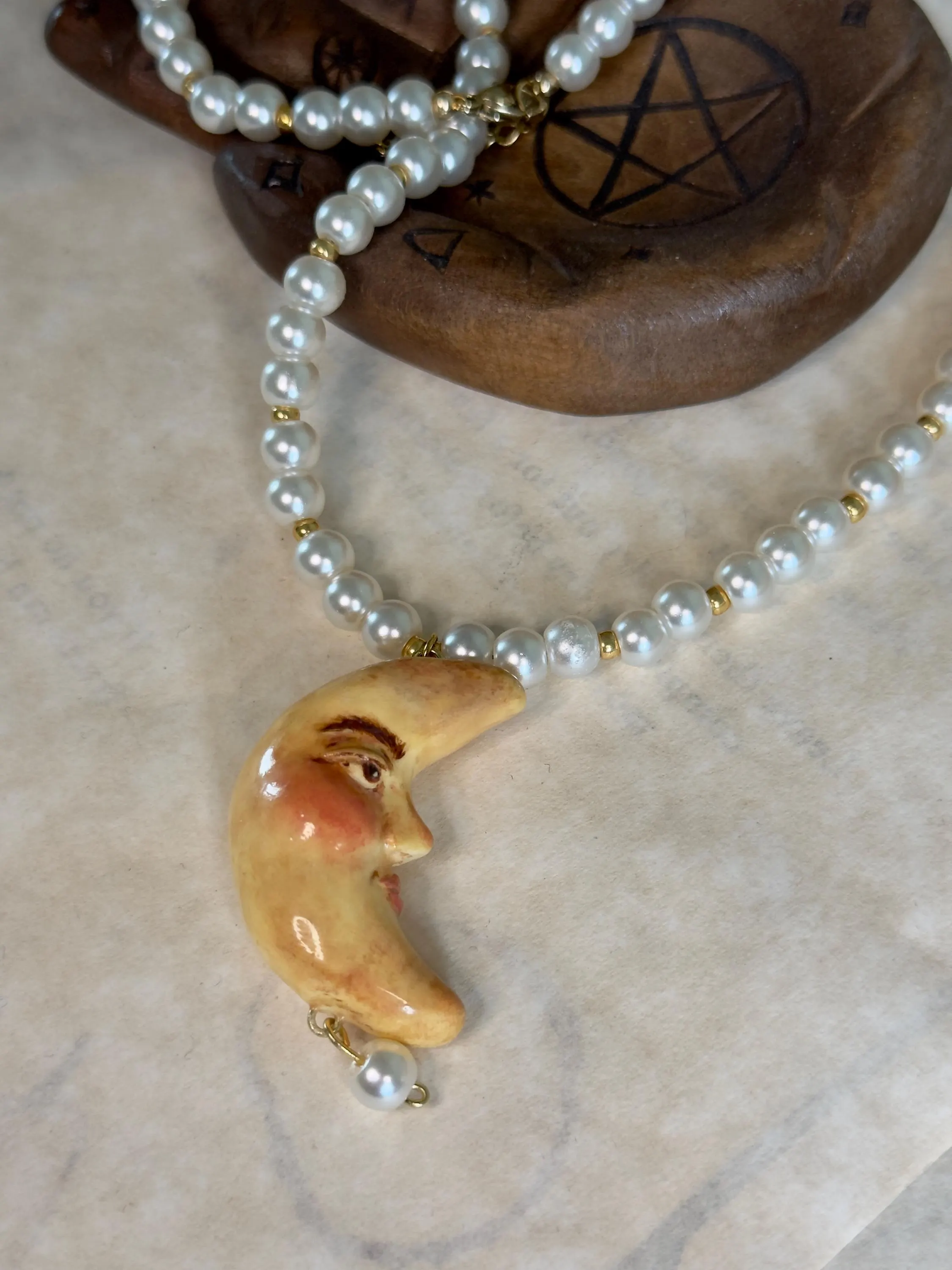 Gold and pearl necklace with textured, vintage inspired moon pendant